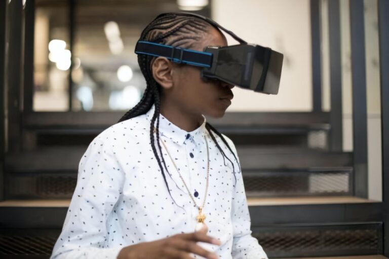 A woman with virtual reality goggles on.