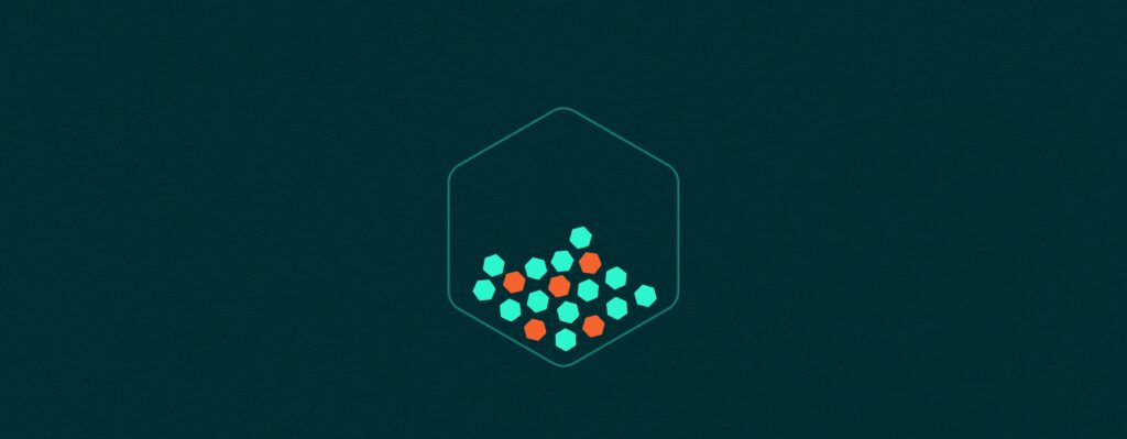 Multiple small green and orange hexagons clustered inside a larger hexagon outline.